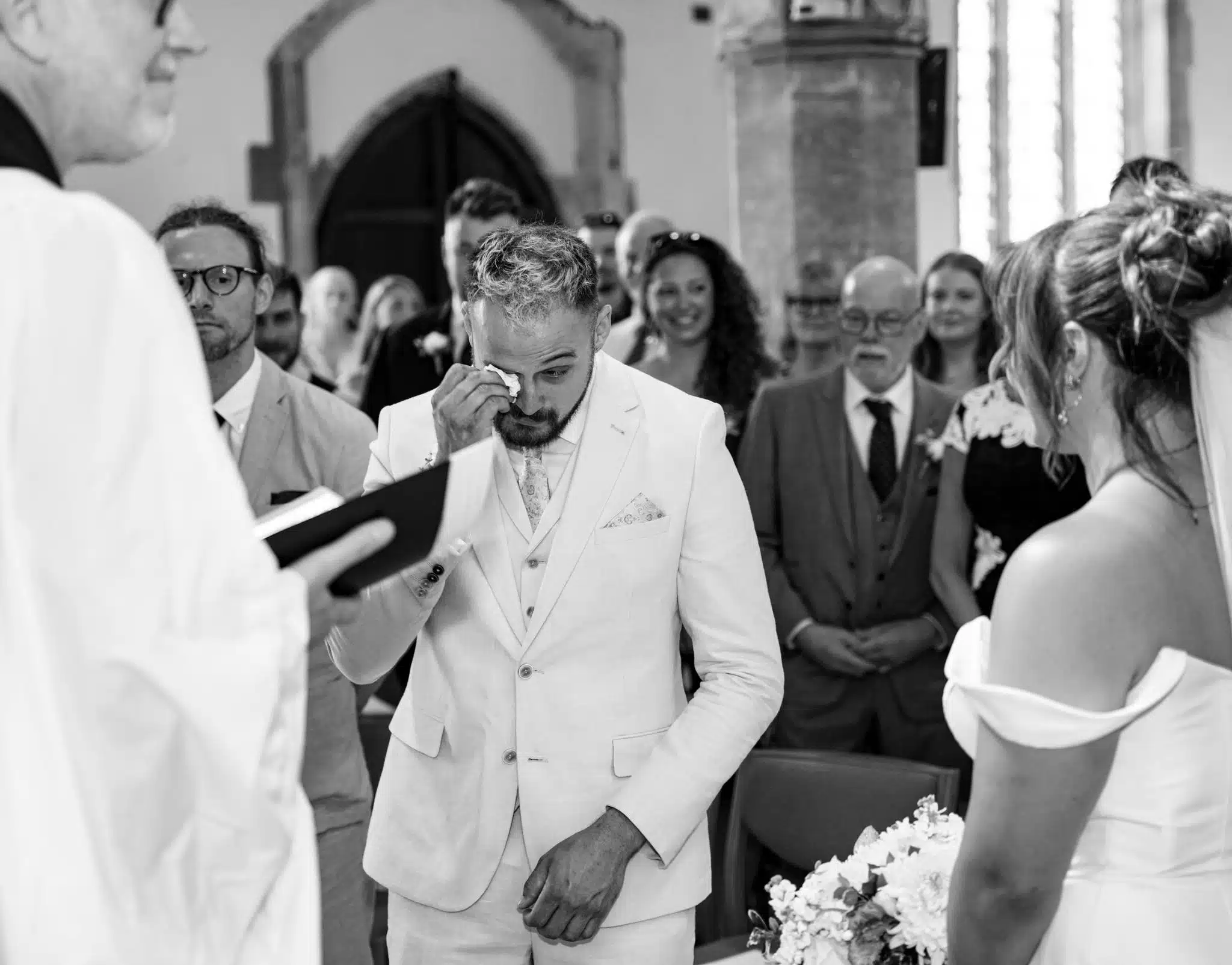 Candid laughter during wedding speeches at a Buckinghamshire manor house