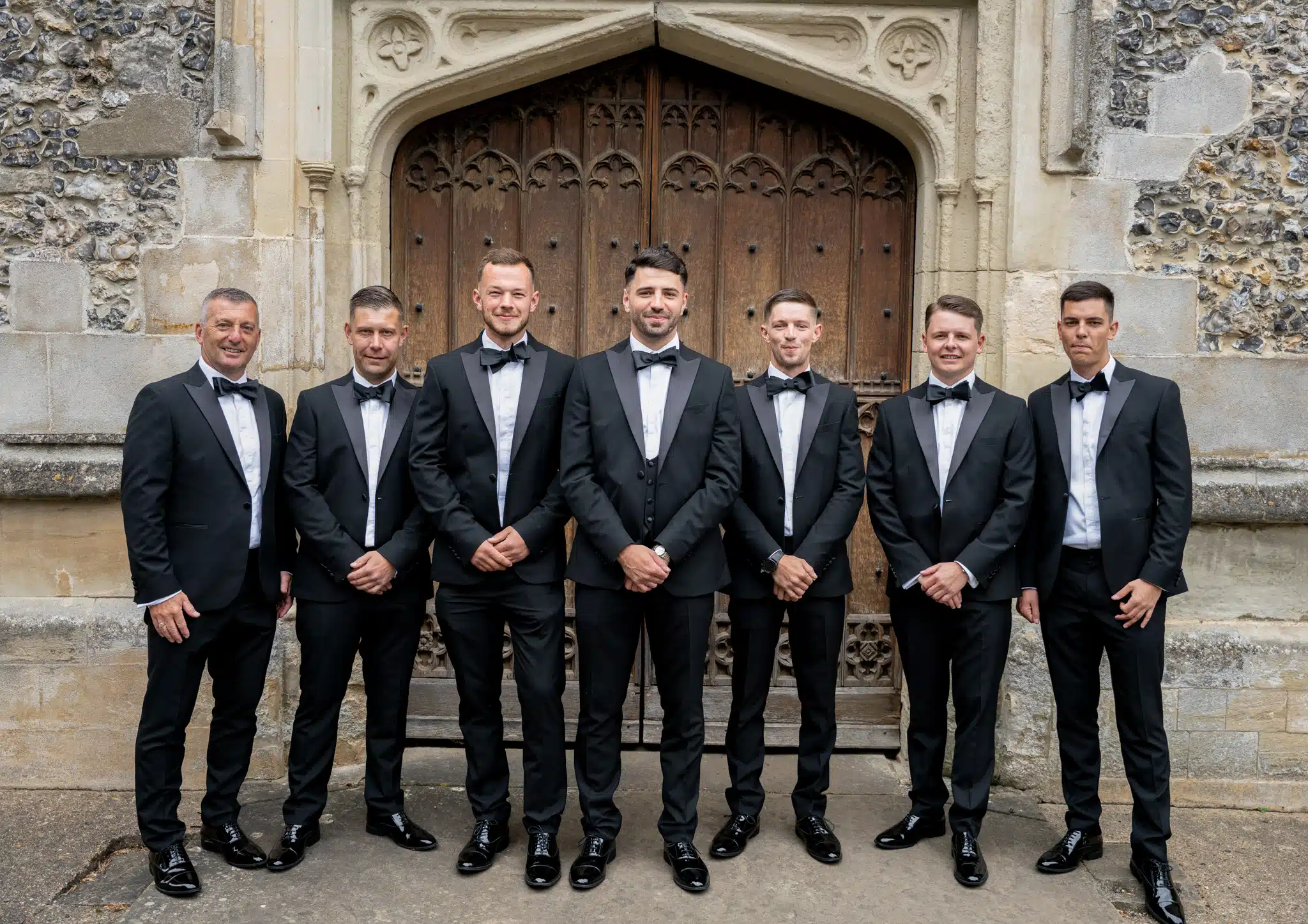 Candid laughter during wedding speeches at a Buckinghamshire manor house