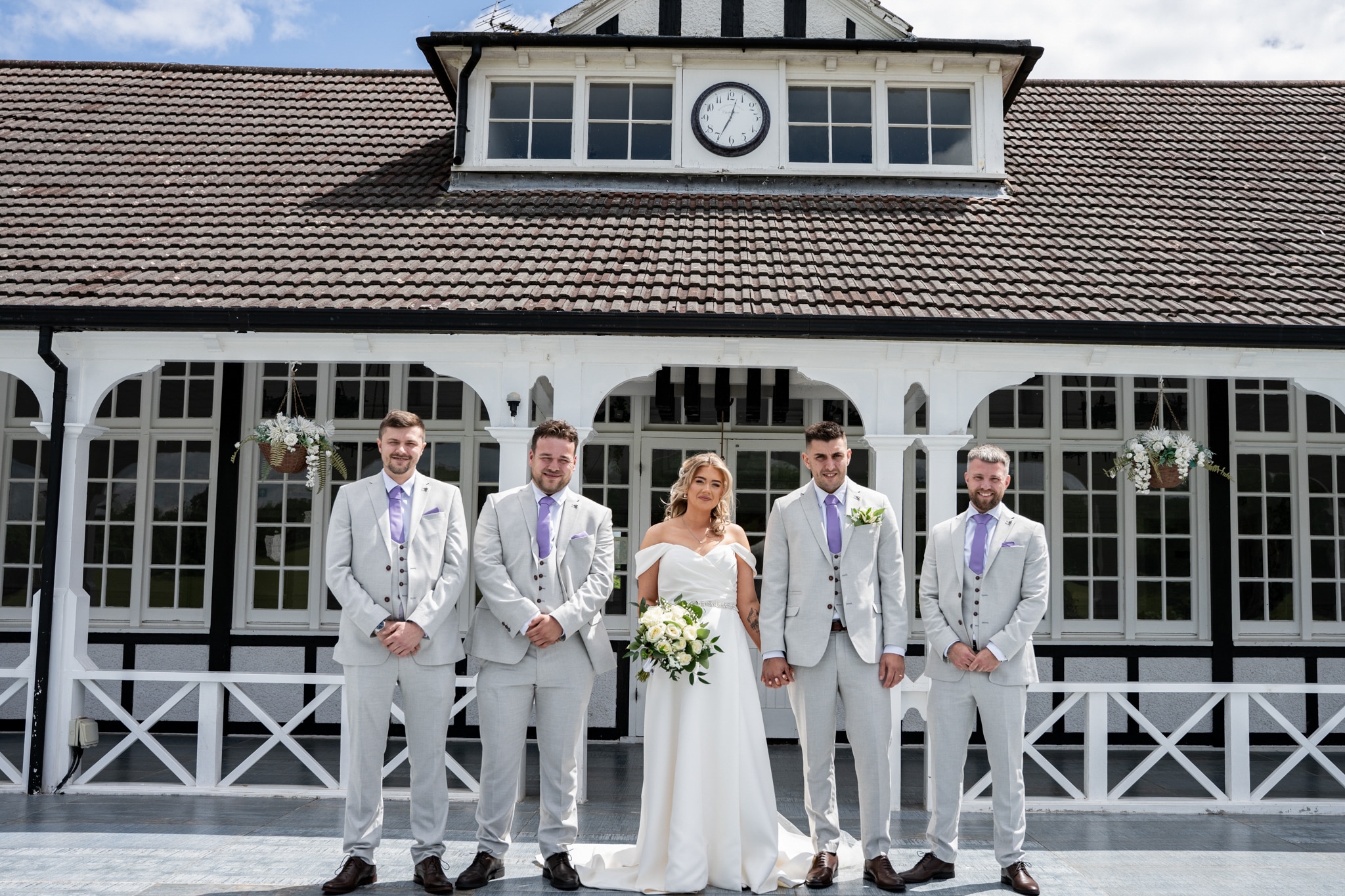 bride and groomsmen at the london shenley club