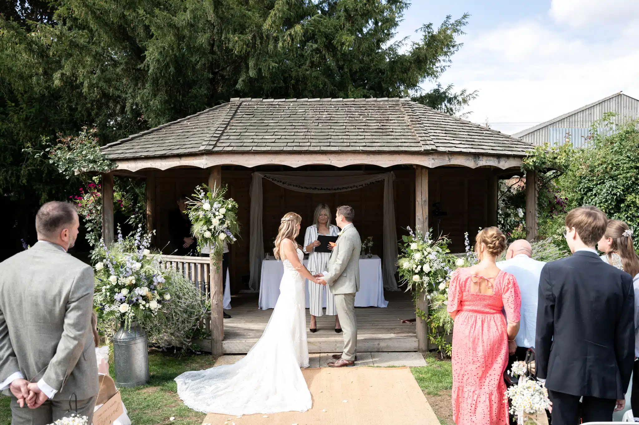 Bride and groom walking through Blenheim Palace gardens – wedding photographer Oxfordshire