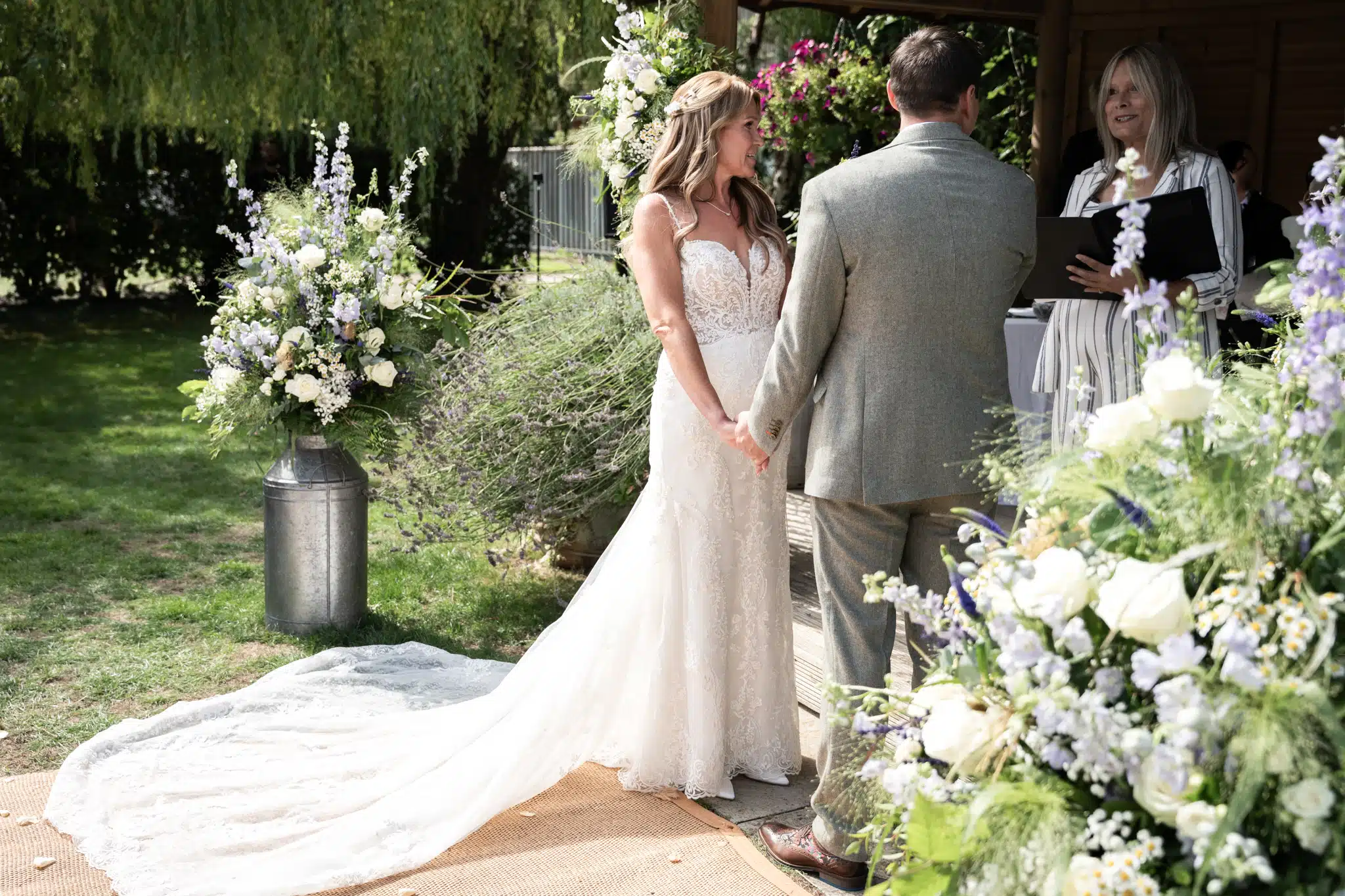 Bride and groom walking through Blenheim Palace gardens – wedding photographer Oxfordshire