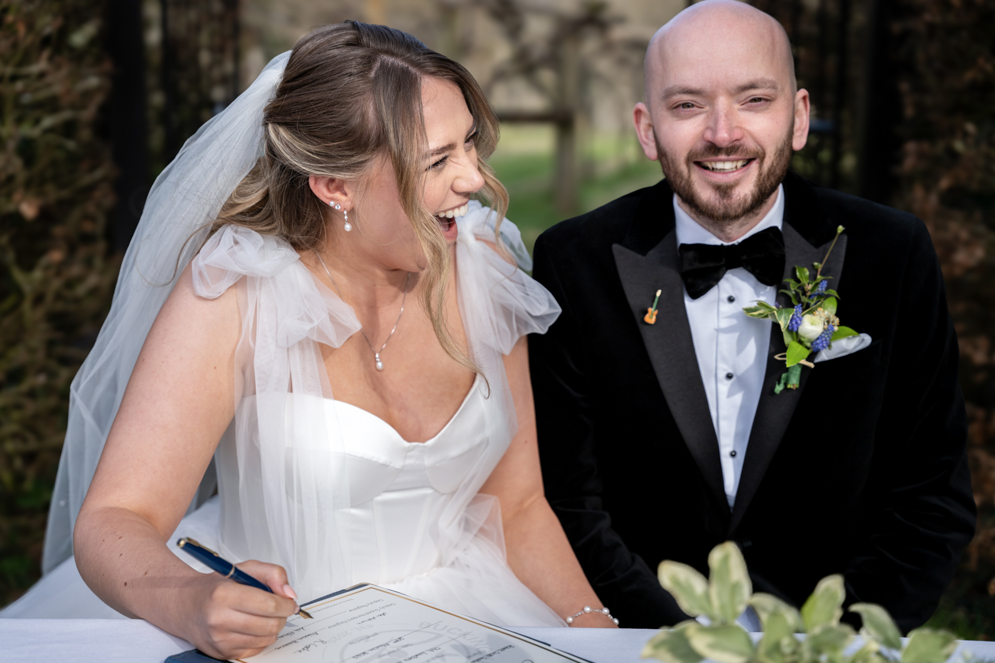bride and groom laughing