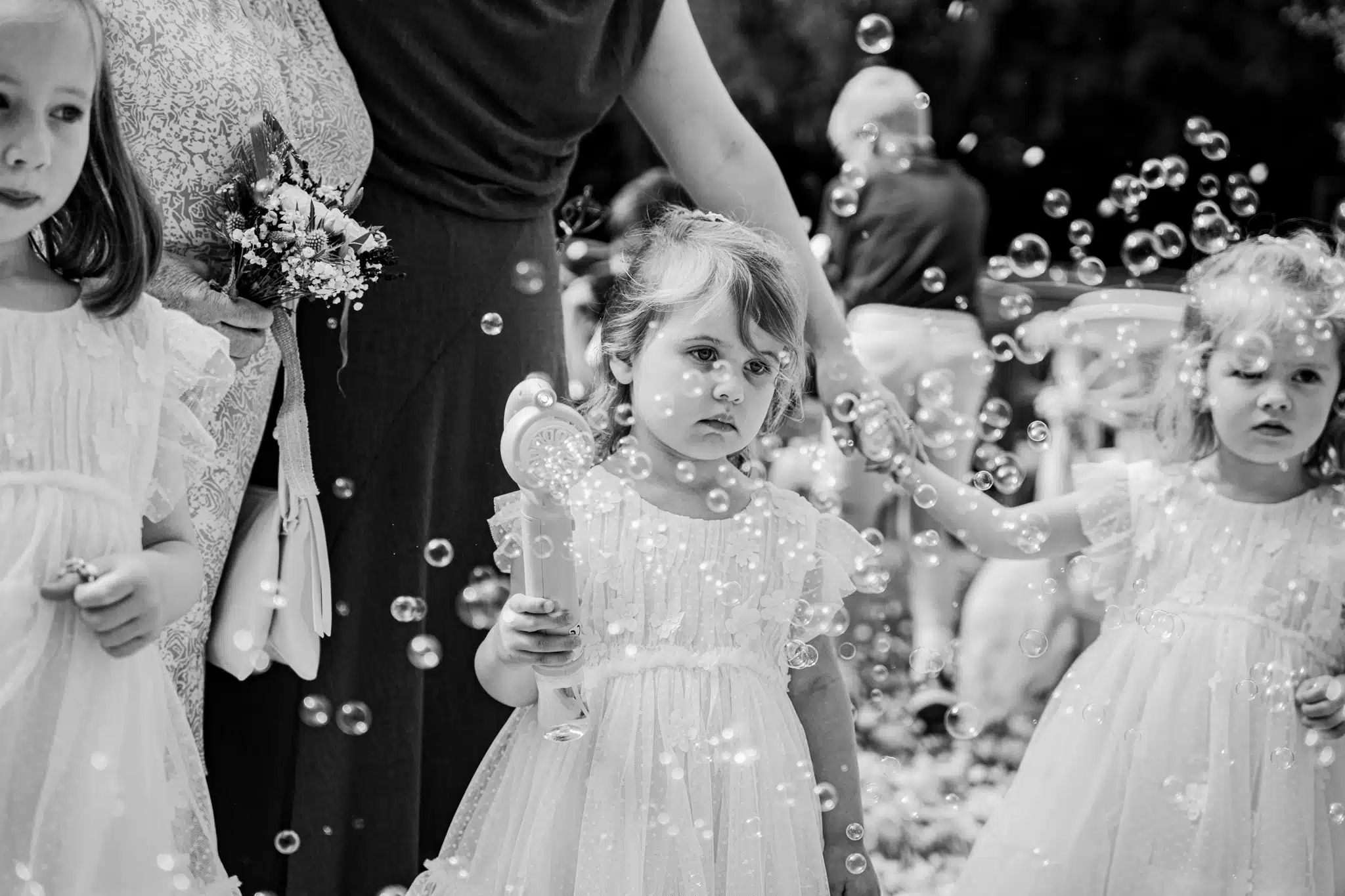 Candid laughter during ceremony in Oxfordshire countryside barn