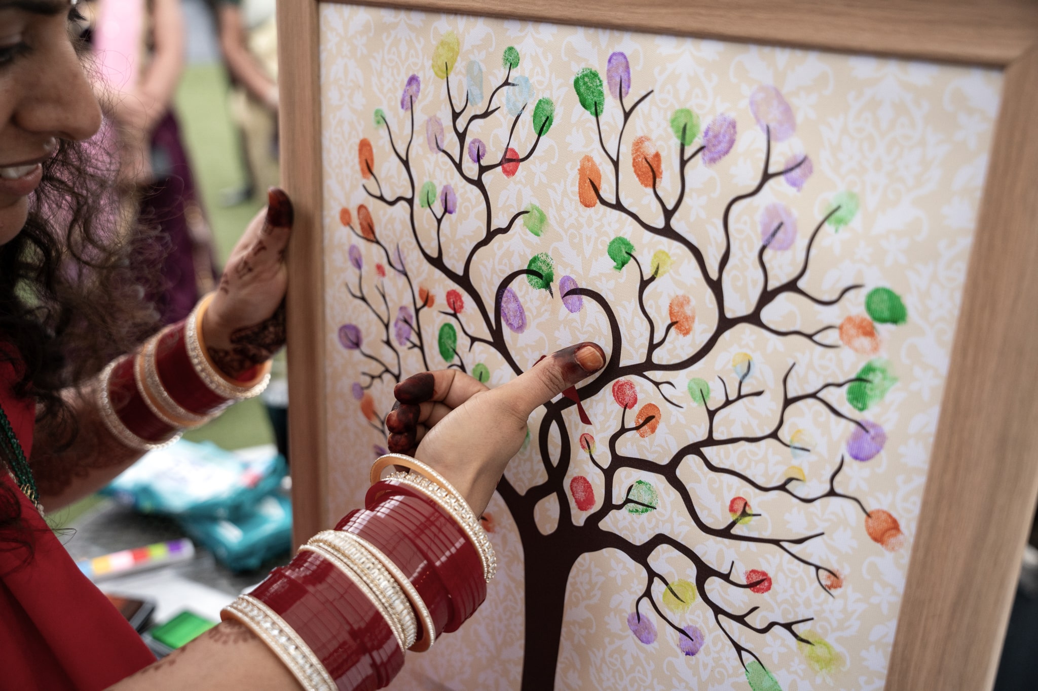 Womans hand creating a painting
