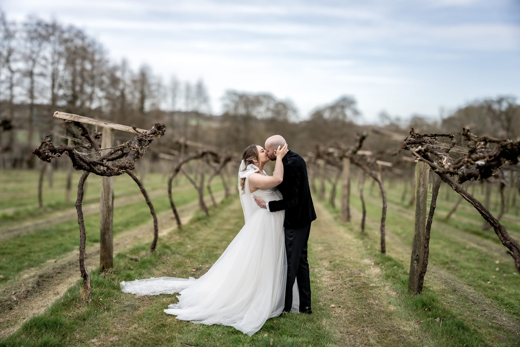 bride and groom at the vinyard at old luxters barn