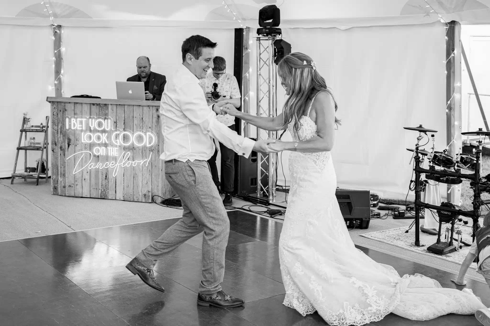 Bride and groom walking through Milton Keynes park – natural wedding photographer Milton Keynes