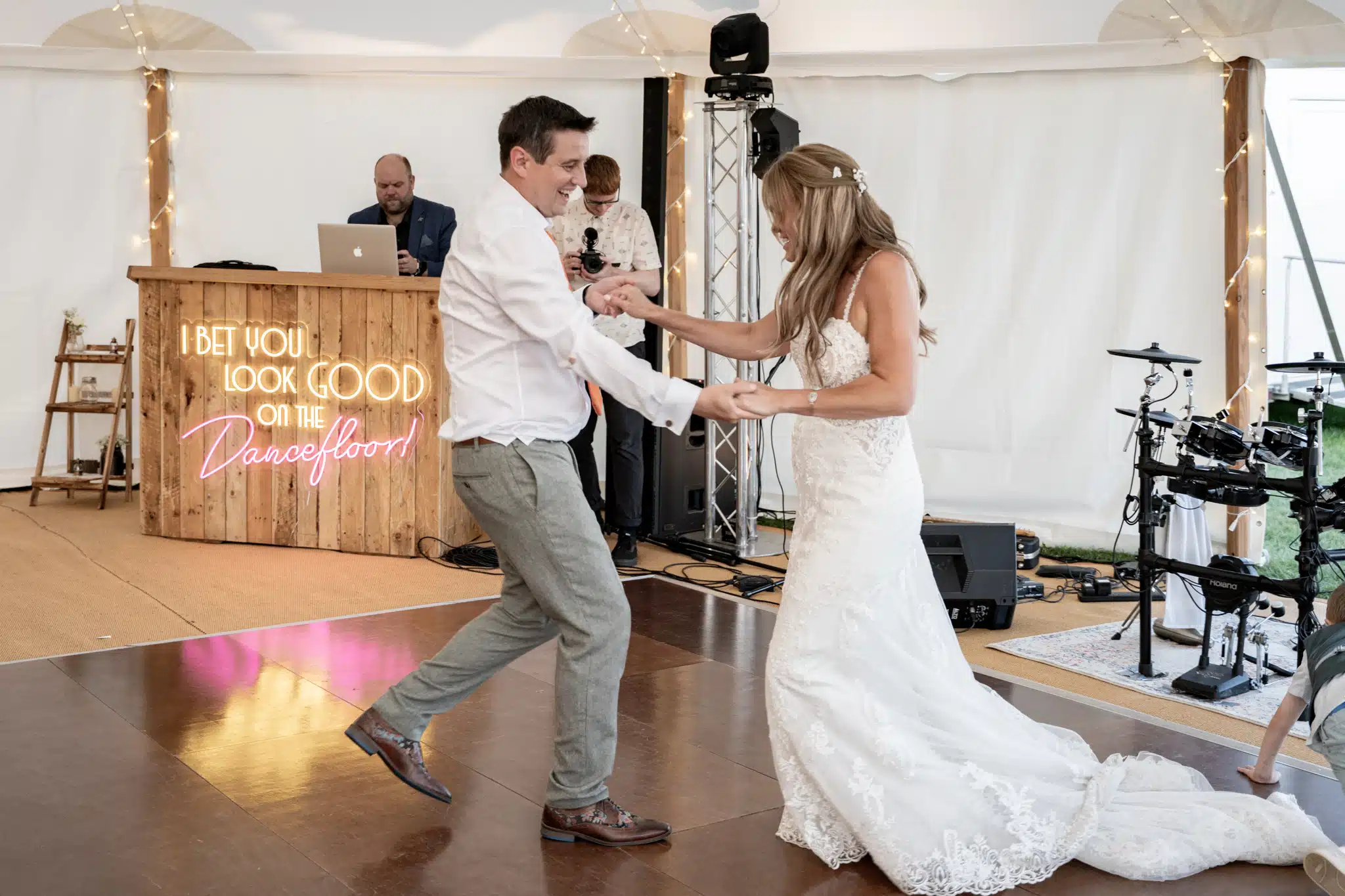 Bride and groom walking through Milton Keynes park – natural wedding photographer Milton Keynes