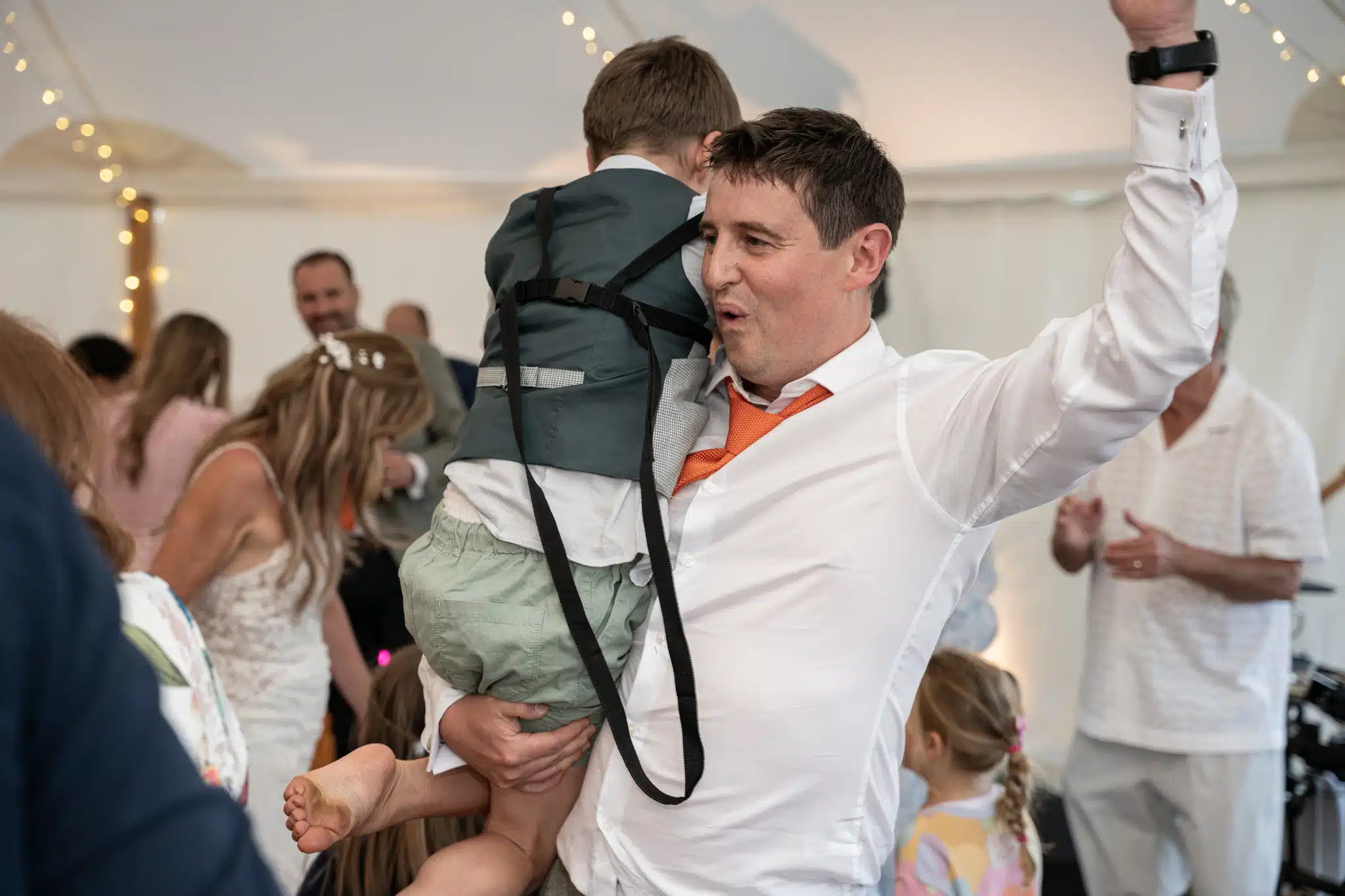 Bride and groom walking through Milton Keynes park – natural wedding photographer Milton Keynes