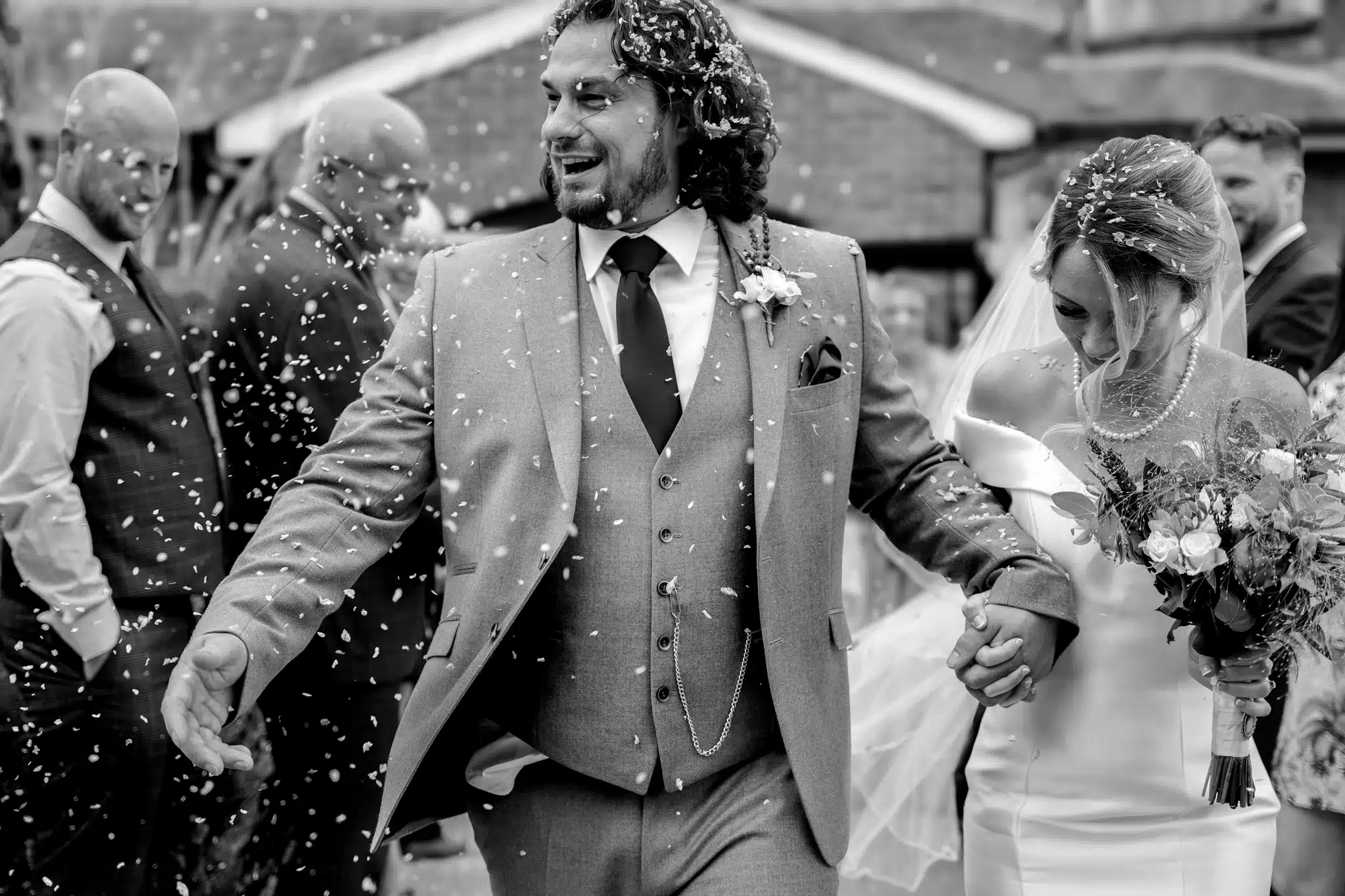 bride and groom confetti shot. The Kings Chapel Old Amersham