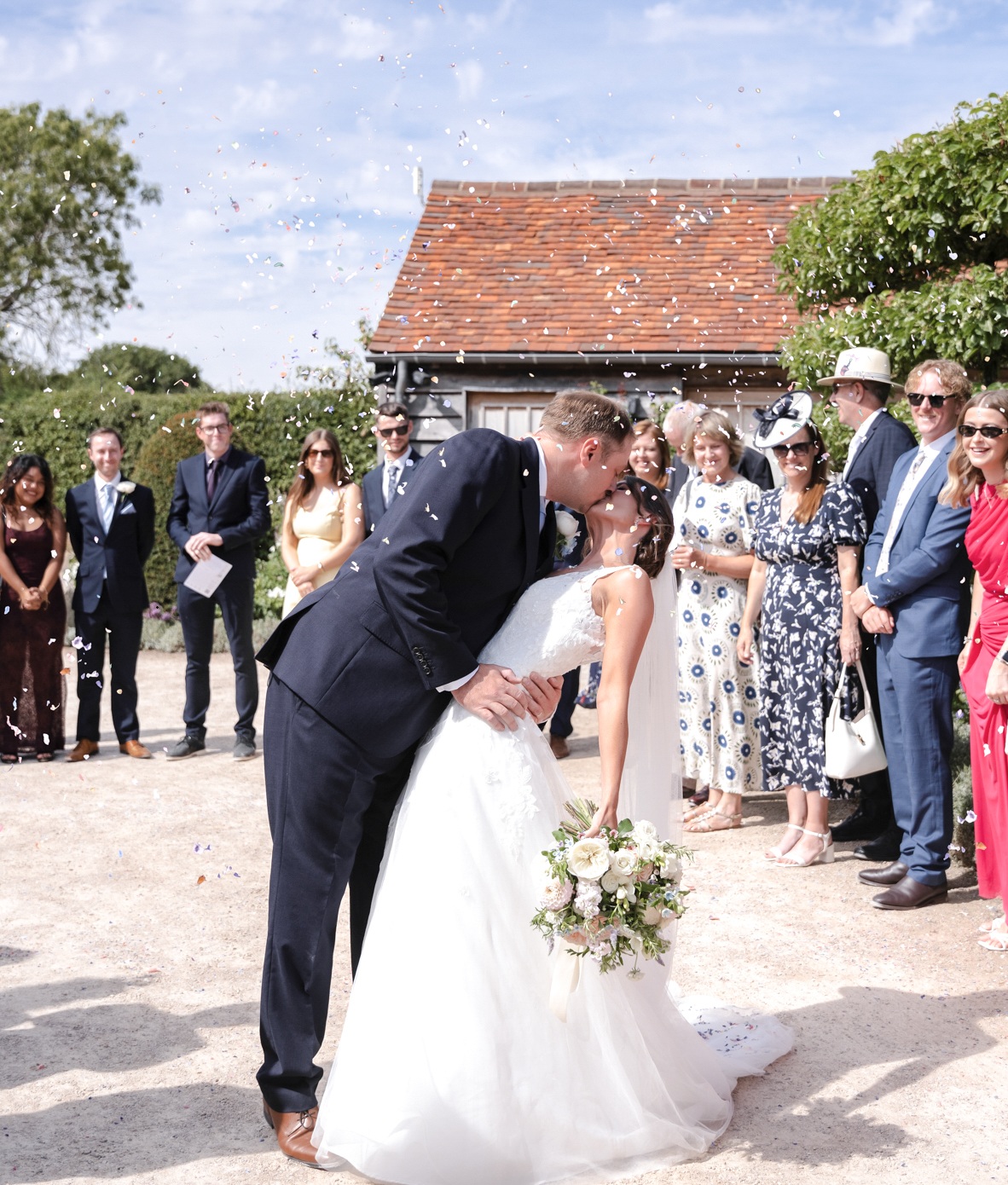 Rackleys barn bride and groom kissing