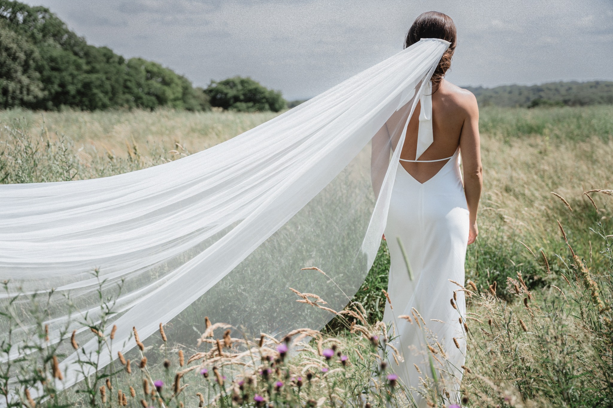 bride with long veil at Rackleys Barn Cadmore End