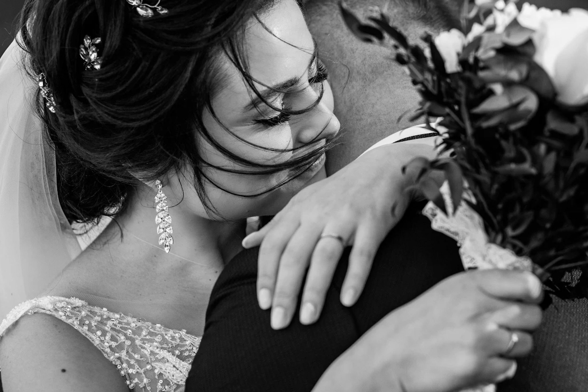 Bride and groom embracing